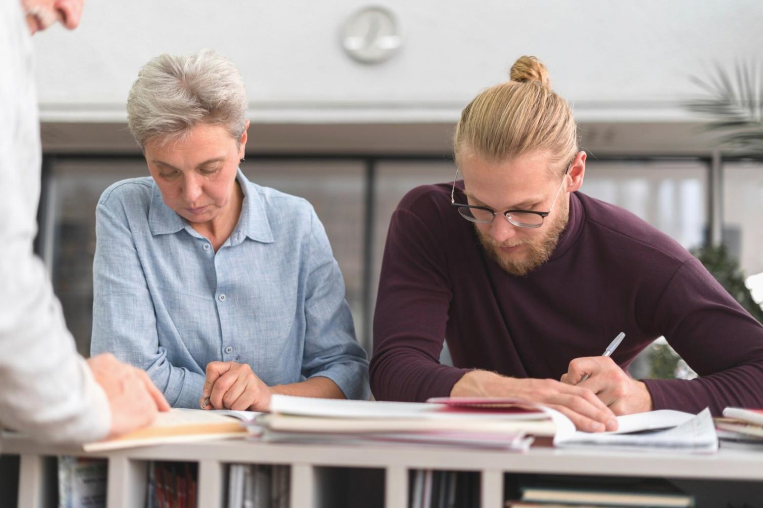 Business team reviewing financial projections and budget scenarios
